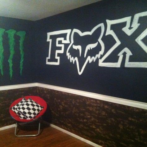 Perfect man's cave!!! Motorcross Bedroom Ideas, Motocross Room Decor, Motocross Room Ideas, Boys Dirtbike Room, Dirtbike Room Ideas, Dirt Bike Themed Bedroom, Motocross Boys Room, Motocross Room, Motocross Garage