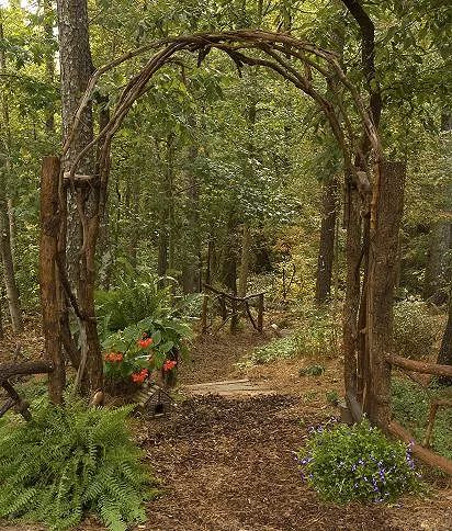 This award winning outdoor space was created by recycling fallen trees, recycled concrete well cover & discarded lum | Hometalk Rustic Arbor, Recycled Concrete, Terrasse Design, Wooden Arch, Garden Arbor, Garden Walkway, Forest Garden, Woodland Garden, Décor Diy