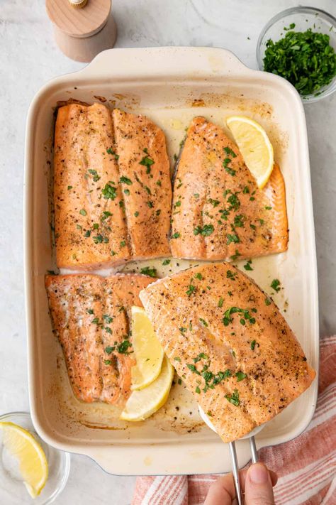 This recipe for lemon pepper salmon is both quick and easy to prepare. It's a protein-rich dinner option with a sharp, citrusy flavor punch. | Lemon Pepper Salmon | Baked Lemon Pepper Salmon | Baked Salmon with Lemon | Lemon Pepper Salmon Recipe | Lemon Pepper Salmon in Oven | Lemon Pepper Fish | Feelgoodfoodie Recipes, Salmon In Oven, Lemon Pepper Fish, Healthy Fish Dinners, Baked Salmon With Lemon, Baked Salmon Lemon, Oven Salmon, Salmon Baked, Lemon Pepper Salmon