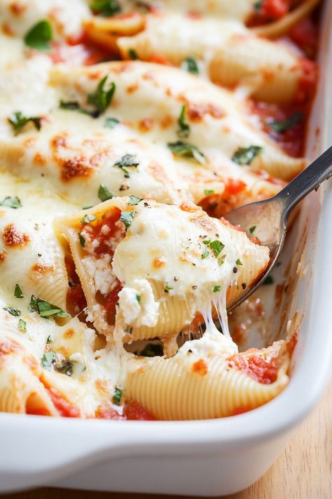 Indulge in a delightful dinner with these creamy cottage cheese stuffed shells that are perfectly seasoned and baked to cheesy perfection. A comforting meal idea that will satisfy your cravings and impress your guests.  Whether you're cooking for the family or hosting a dinner party, these cheesy and flavorful shells are sure to be a hit every time. Bring Italian flavors to your table with this mouthwatering dish!

Ingredients
12 jumbo pasta shells
2 cups pasta sauce
1 and 1/2 cups shredded mozz Cottage Cheese Stuffed Shells, Stuffed Shells With Cottage Cheese, Cheese Stuffed Shells Recipe, Low Calorie Pancakes, Cottage Cheese Pasta, Spinach Stuffed Shells, Stuffed Shells Ricotta, Jumbo Pasta Shells, Shells Recipe