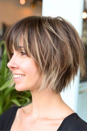 Short Bob Choppy Layers, Choppy Bob With Face Framing Layers, Whisky Bob Hair, Short Edgy Bob With Bangs, Stacked Haircuts With Bangs, Layers Bob Short, Short Choppy Hair With Bangs, Short Bob Long Bangs, Easy To Style Short Haircut For Women