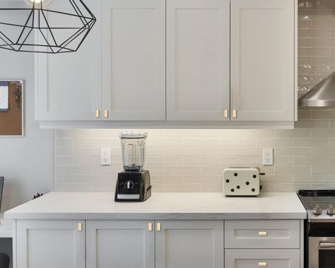 Kitchen with gold hardware