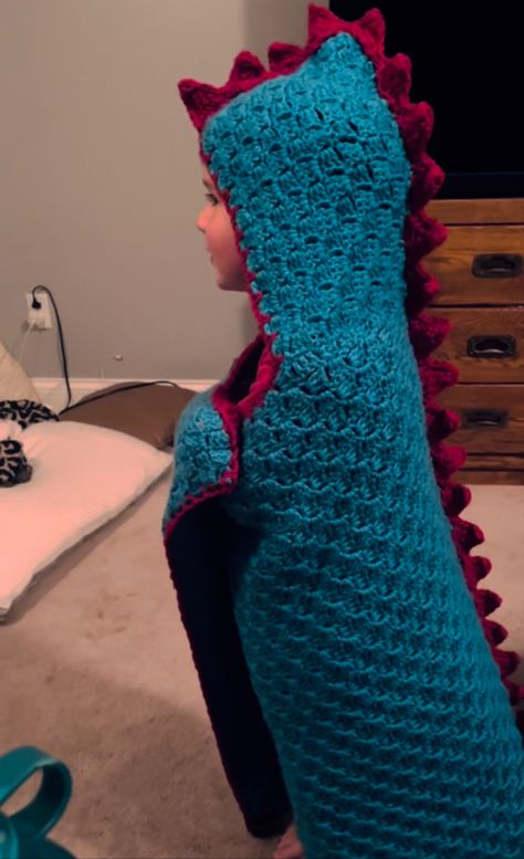 Crochet Animals Blanket, Crochet Dinosaur Slippers Free Pattern, Crochet Hooded Blanket Kids, Hooded Blanket Crochet Pattern Free, Crochet Blanket Yarn Amigurumi, Wearable Crochet Projects, Dragon Blanket Crochet, Dinosaur Crochet Blanket, Crochet Dinosaur Blanket