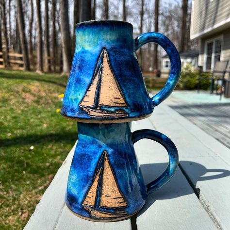 Dreaming of sunnier days ☀️🌊⛵️ One of my favorite ocean glaze combos on these custom skipjack sailboat mugs! #ceramics #pottery #mug #handmadepottery #womeninceramics #ocean #skipjack #sail Sailboat Pottery, Ocean Ceramics, Glaze Combos, Pottery Inspo, Pottery Classes, Pottery Mug, Ceramics Pottery, Pottery Mugs, Handmade Pottery