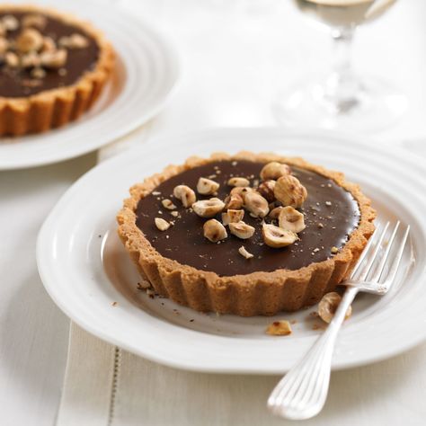 Chocolate Ganache Tarts | Dessert Recipes | Woman&home Almond Torte, Chocolate Tarts Recipe, Chocolate Ganache Tart, Best Chocolate Desserts, Tart Dessert, Chocolate Hazelnut Spread, Chocolate Nuts, Chocolate Dessert Recipes, Chocolate Tart