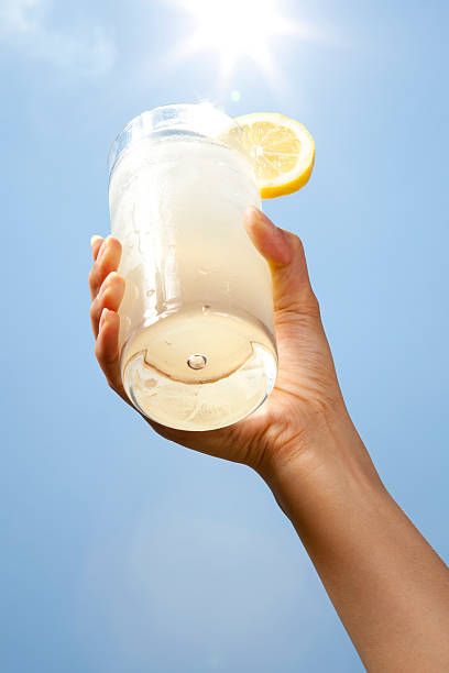 666 Hand Holding Lemonade Photos and Premium High Res Pictures - Getty Images Hand Holding, Cilantro, Glass Of Milk, High Res, Lemonade, Getty Images, Photo Image, Stock Photos, Photography