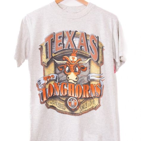 Vintage Ncaa Texas Longhorns Logo T-Shirt, Texas Longhorns Shirt, University Of Texas, Unisex T-Shirt Sweatshirt, Vintage Shirt Our Classic T-Shirt Serves As The Perfect Short-Sleeved Shirt For Your Unique, Funny, Or Personalized Designs. Brand: Gildan Heavy Weight Fabric Classic Unisex Makes This An Easy Fit Size Up If You Want Something Roomier Our Shirts Materials: 100% Cotton ** Note: - Double Check Your Address Before Ordering. - If You Want To Return The Goods, You Are The One To Pay The S Texas Longhorns Shirts, Texas Longhorns Logo, Texas Longhorns Football, Texas Football, Texas Shirts, 90s Sweatshirt, College Shirts, Tiger T Shirt, Cool Graphic Tees