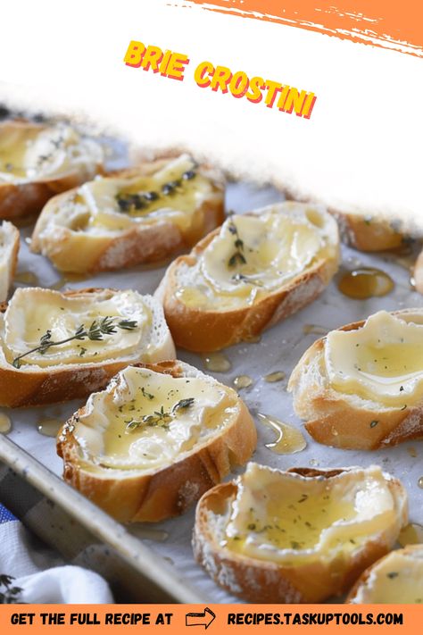 Indulge in the delightful flavors of our Brie Crostini, a sophisticated appetizer perfect for any occasion. This easy-to-follow recipe combines creamy Brie cheese with crisp, toasted baguette slices, topped with a hint of sweetness and a touch of herbaceous goodness to create an irresistible bite. Ideal for entertaining guests or enjoying a cozy night in, this Brie Crostini will elevate your culinary experience with its rich taste and simple preparation. Pin now to discover the perfect blend of textures and flavors that make Brie And Baguette, Crostini Appetizers Easy, Brie Cheese Recipes Appetizers, Brie Baguette, Easy Crostini, Toasted Baguette Slices, Brie Crostini, Brie Cheese Recipes, Creamy Brie