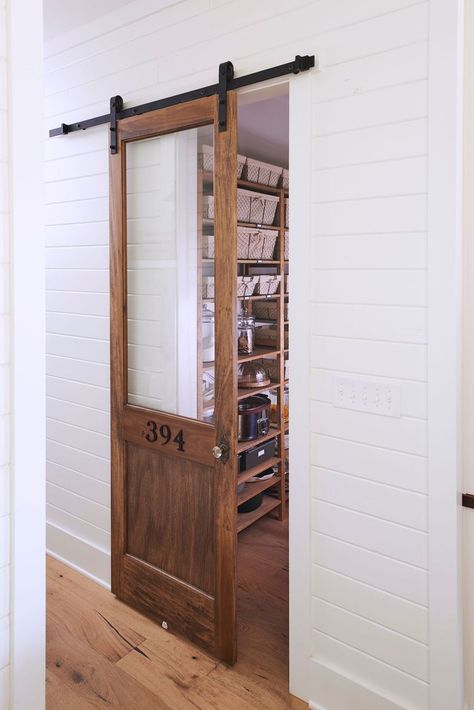 22 Barn Door Ideas for Every Room of Your Home Arched Barn Door, Yard Door, Barn Door Ideas, Walk In Pantry Ideas, Barn Door Pantry, Interior Door Styles, White Barn Door, Pantry Remodel, White Shiplap Wall