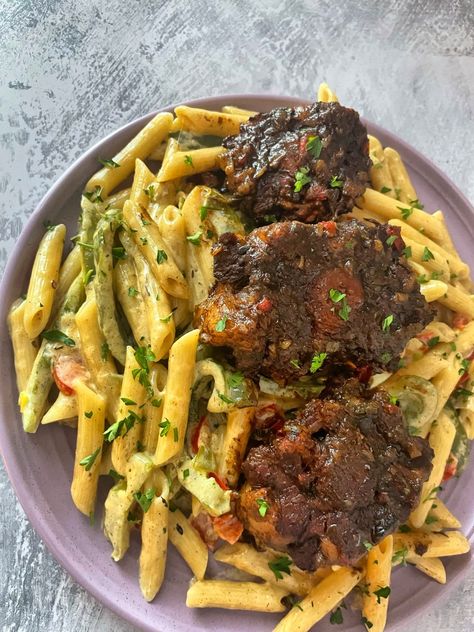 Creamy Oxtail Rasta Pasta AKA “Close the Deal Pasta” - Jamaican Oxtail Stew, Rasta Pasta Recipe, Oxtail Recipe, Jamaican Oxtail, Rasta Pasta, Brown Stew Chicken, Cod Fish Recipes, Oxtail Stew, Oxtail Recipes