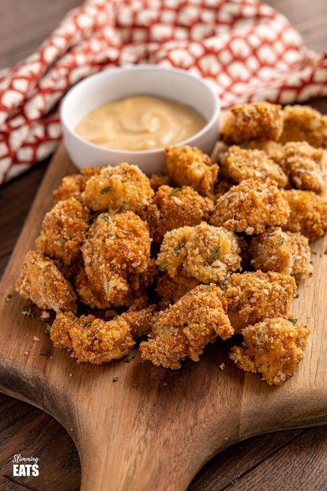 Popcorn Chicken - tender oven baked pickle brined Popcorn Chicken Bites served with the perfect chicken dipping sauce, these will be gone in seconds and loved by the whole family. Slimming World and Weight Watchers friendly Chicken Tenders Oven, Baked Popcorn Chicken, Chicken Pop, Dipping Sauces For Chicken, Fakeaway Recipes, Food Courts, Chicken Tender, Nuggets Recipe, Perfect Chicken