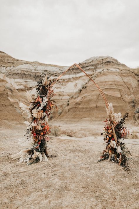 Copper wedding ceremony arch in the Badlands of Drumheller Alberta 10 Ceremony Arch Ideas Perfect for Your Mountain Wedding or Intimate Elopement #ceremonyarches #weddingarch #ceremonydecor #ceremonydesign #weddingceremony #elopementarch Ceremony Arch Ideas, Event Space Decor, Copper Wedding Arch, Bronte Bride, Arch Ideas, Bohemian Style Wedding, Wedding Arches, Wedding Ceremony Arch, Copper Wedding