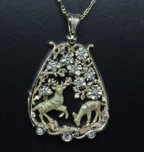 This very special pendant, was designed and made by George Postgate to be a special gift from his brother John, to John’s wife Mary, in celebration of their 53rd wedding anniversary. If you like this piece, you may really enjoy looking at some of our other designs that were inspired by nature? Follow this link and enjoy: https://postgatejewelers.com/product-category/flowers-vines-and-animal-jewelry/ Collectible Nature-inspired Pendant Jewelry, Stag Jewelry, Stag And Doe, Gold Deer Necklace, Deer Jewelry, Deer Antlers Necklace, Cocktail Earrings, Scottish Jewellery, Woodland Scene