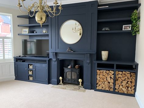 Blue Panelled Living Room, Blue Cabinets Living Room, Navy Panelled Living Room, Dark Blue Fireplace Mantle, Navy Blue Built Ins Around Fireplace, Indigo Living Room, Deep Blue Built Ins, Navy Tv Wall, Panelled Walls Living Room Fireplaces