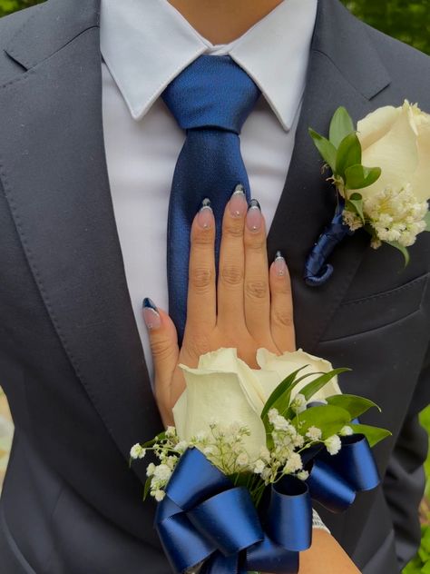 Prom Suits And Dresses, Black Suit With Royal Blue Tie, Black Prom Dress With Blue Accessories, Corsage Navy Blue Dress, Suits To Go With Navy Prom Dress, Black Suit With Blue Bow Tie, Black Suit With Navy Blue Tie, Suits With Blue Tie, Navy Blue Prom Dress With Date