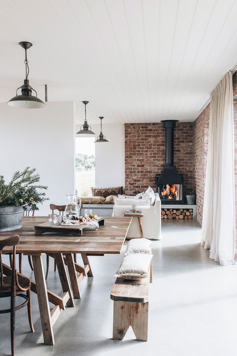 The open-plan living and dining area of this modern country home in Tasmania features a wood burning fireplace. Off Center Fireplace Ideas, Off Center Fireplace, Center Fireplace, Living And Dining Area, Long Narrow Living Room, Country Style Magazine, Modern Country Living, Country Fireplace, Open Plan Living And Dining