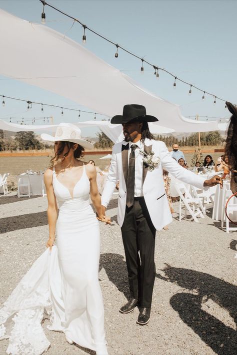 Wedding Dress With Cowgirl Hat, Cowgirl Hat Wedding Dress, Cowboy Boot Wedding Dress, Cowboy Hat Wedding Dress, Groom With Cowboy Boots, Tux With Cowboy Boots, Cowboy Wedding Outfit, Wedding Dress With Hat, Wedding Cowboy Hat