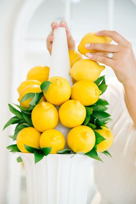 DIY Lemon Centrepieces - 3 Ways! — Home with Gabby Lemon Tablescape, Mom Brunch, Lemon Table Decor, Mediterranean Party, Lemon Centerpieces, Topiary Diy, Tea Party Table, Summer Boat, Lake House Food Ideas