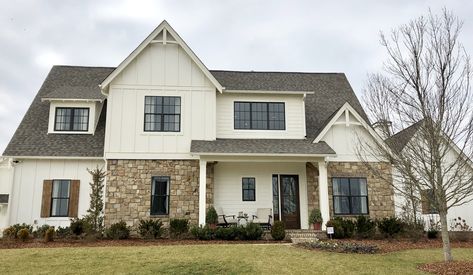 Alabaster Siding; Alabaster trim; Franklin Limestone Ashlar Stone; Hawthorne stained front door and shutters; Weathered Wood shingles; Bronze metal roof; Black front windows; white sides and rear windows House Exterior Cream, Weathered Wood Shingles On White House, White And Brown House Exterior, White Siding With Stone, Weathered Wood Roof, Bronze Metal Roof, Bronze Gutters, Cream Siding, Siding Combinations