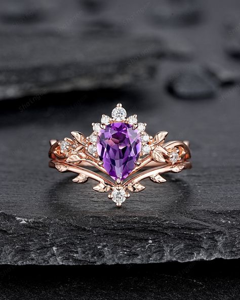 ★Description Main ring: *Center stone: 1.1 carat 8x6mm Pear Shape Natural Amethyst *Accent stone: colorless moissanite *Band Width(Bottom): 1.6-1.7mm Wedding band: *Accent stone: colorless moissanite  Band width: 1.6-1.7mm ★Procedure information Please select the material and ring size from the drop-down menu on the right side of the listing. If you have any special requests or questions, please do not hesitate to contact us. ★Shipping information The item will be gift box wrapped and shipped to US and worldwide. ★Return Policy We provide 14 days return. For returned item, as this is handmade jewelry. Handcrafted fee and shipping fee will be deducted, the remaining amount will be refunded after we receive the ring.. ★ We offer a 3 months warranty on our product. Happy Purchase! Thomas♥ Luxury Marquise Cut Amethyst Ring For Anniversary, Luxury Lavender Amethyst Promise Ring, Purple Amethyst Ring With Rose Cut Diamonds For Wedding, Purple Marquise Cut Amethyst Ring For Anniversary, Purple Amethyst Marquise Cut Ring For Anniversary, Luxury Purple Pear-shaped Ring, Elegant Pear-shaped Amethyst Promise Ring, Elegant Pear-shaped Amethyst Anniversary Ring, Fairy Engagement Ring Amethyst