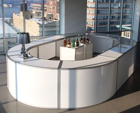 the tate curve -- this rounded counter piece can be used to build a full circular bar and can also be paired with our original Tate Bar to create an oval shape (as pictured) -- taylor creative inc Rack Velo, Circular Bar, U Shaped Bar, Curved Reception Desk, Atrium Design, Circle Bar, Modern Home Bar, Commercial Bar, Event Bar