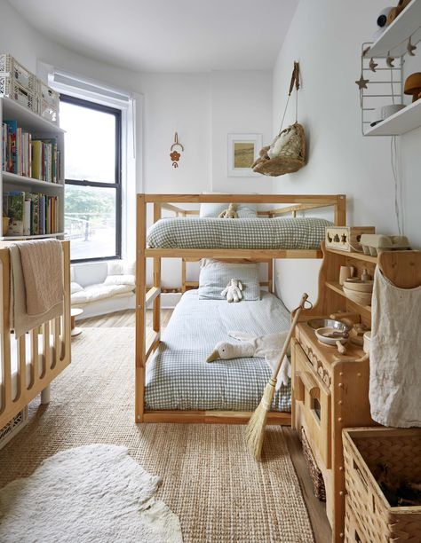 Family of Five in a 600-Square-Foot NYC Rental Apartment | Apartment Therapy Natural Bed Frame Ideas, Room With Crib And Bed, Modern Cottage Guest Room, World Market Bedroom, Living Room With Corner Windows, Two Bed Kids Room, Earthy Kids Bedroom, Kids Apartment Bedroom, Natural Kids Room