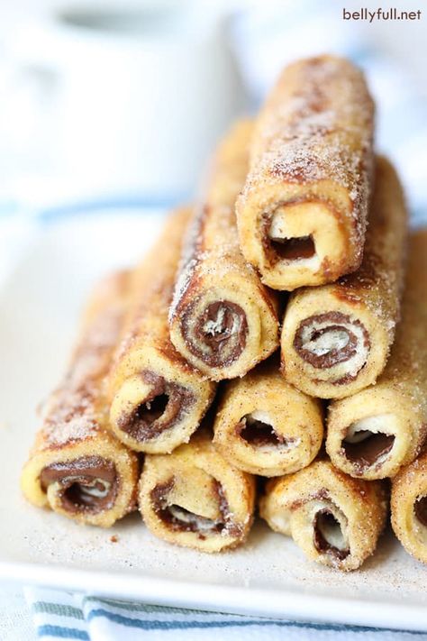 French Toast Roll-Ups stacked in a pyramid Ww Muffins, Toast Roll Ups, Ramadan Sweets, Pancake Roll, Vegetarian Nachos, French Toast Roll Ups, French Toast Rolls, Breakfast Enchiladas, Coffee Trailer