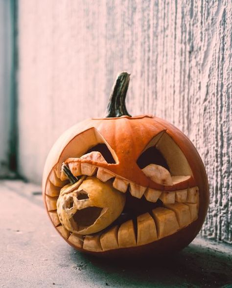 Close-Up Of Jack O Lantern On Window Sill During Halloween Small Pumpkin Carving Ideas, Hungry Pumpkin, Unique Pumpkin Carving Ideas, Funny Halloween Decorations, Cute Pumpkin Carving, Pumkin Carving, Creative Pumpkin Carving, Amazing Pumpkin Carving, Easy Pumpkin Carving