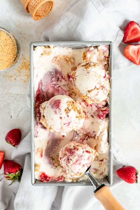 A deeply flavorful strawberry cheesecake ice cream that tastes just like your favorite dessert in this ultimate summer mash up Strawberry Cheesecake Ice Cream Recipe, Horchata Ice Cream, Cream Cheese Ice Cream, Churro Ice Cream Sandwich, Cheesecake Ice Cream Recipe, Churro Ice Cream, Easy Strawberry Cheesecake, Strawberry Cheesecake Ice Cream, Raspberry Crumble