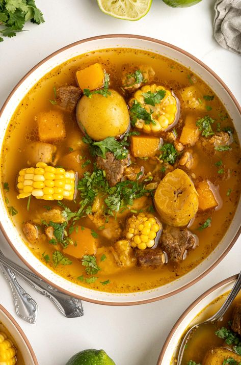 Savor the rich flavors of Puerto Rican cuisine with this hearty beef and root vegetable stew, lovingly crafted by Salima's Kitchen. Chicken Sancocho, Sancocho Puerto Rican, Caribbean Soup, Chicken And Root Vegetables, Sancocho Recipe, Sancocho Colombiano, Root Vegetable Stew, Stewed Beef, Puerto Rican Food