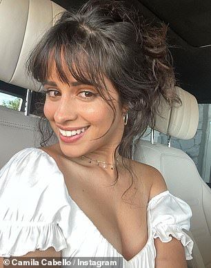 Camila Cabello heads to lunch in Hollywood in tblack crop top with nude hoodie and drawstring pants | Daily Mail Online Long Shag Haircut, Cabello Hair, 70s Hair, Half Ponytail, Wispy Bangs, Long Hair With Bangs, Shag Haircut, Mode Inspiration, Hair A