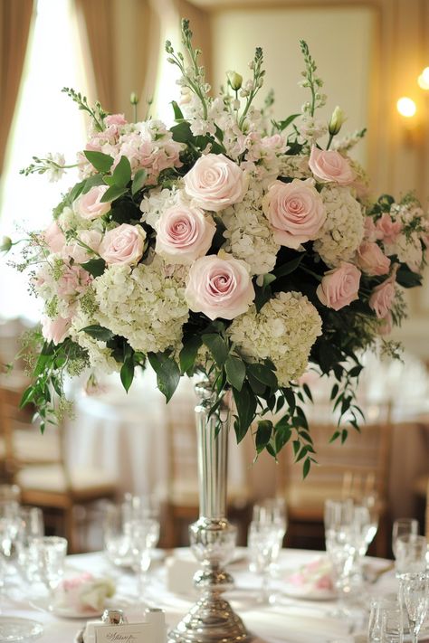 Looking for timeless wedding décor? These 30+ pastel wedding centerpieces will bring a chic and sophisticated vibe to your reception. Whether you're going for classic or modern, these centerpieces fit perfectly with any pastel wedding theme. #pastelweddingdecor #centerpieceideas #weddingstyle Wedding Centerpieces Pink And White, Light Pink Floral Arrangements, Flower Arrangements Wedding Table, Green And Pink Wedding Theme, Pink White And Green Wedding, Debut Backdrop, Light Pink Wedding Theme, Pastel Centerpieces, Pale Pink Wedding Flowers