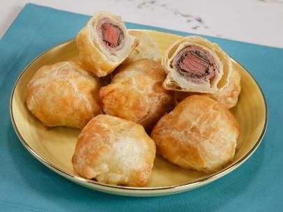 Mini Beef Wellington Bites Recipe | Jeff Mauro | Food Network Wellington Bites, Beef Wellington Bites, Individual Beef Wellington, Mini Beef Wellington, Beef Wellington Recipe, Beef Filet, Food Network Canada, Frozen Puff Pastry, Beef Wellington