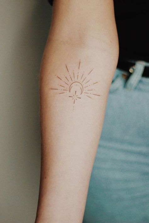 38 Amazing Small Sun and Moon Tattoo Ideas Sun And Moon Wrap Around Tattoo, Half Sun Wrist Tattoo, Free Spirit Wild Heart Tattoo, Sun Moon Elbow Tattoo, Sun Name Tattoo, Sun And Moon Stars Tattoo, Midnight Sun Tattoo, Sun And Moon Tattoo Placement, Fineline Sun And Moon Tattoo