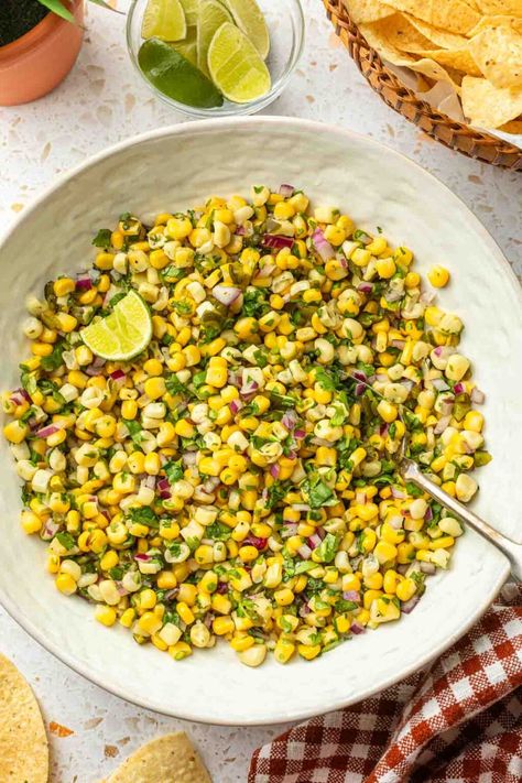 This roasted chili corn salsa is made with vibrant, golden kernels of sweet corn and bursting with bright flavors from diced red onions and fresh cilantro. The charred, roasted poblanos add plenty of flavor and a touch of heat that is balanced by a zesty lime dressing. This summer salsa recipe has an outstanding crunch, plus it's is as refreshing as it is beautiful. Roasted Chili Corn Salsa, Summer Salsa Recipes, Chili Corn Salsa, Asian Chicken Wraps, Summer Salsa, Peanut Chicken, Corn Salsa, Asian Chicken, Lime Dressing