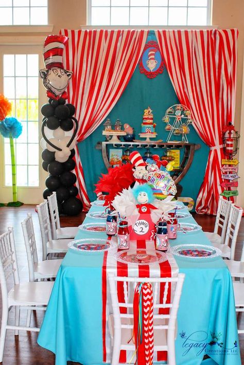 A Seussical Adventure | CatchMyParty.com Cat In The Hat Table Decorations, Cat In The Hat Backdrop, Cat In The Hat Party Decorations, Cat In The Hat Birthday Party Food, The Cat In The Hat Birthday Party, Cat In The Hat First Birthday, Cat And The Hat Birthday Ideas, Cat In The Hat Birthday Party, Thing 1 Thing 2 Birthday Party Ideas