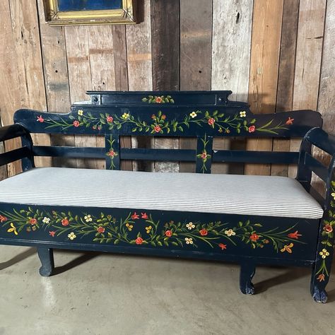 A lovely original hand painted pine bench settle. Traditional Hungarian tulip and floral design, on a deep blue background. Newly upholstered bench seat in blue ticking (FR). The seat pulls out to reveal open storage space, or pull out bed! 👉message for further details 👌 #bench #seating #daybed #hungarian #floral #floraldesign #upholstered #storage #love #interiorstyling #interiores #style #interiordecor #home #antique #vintage #handpainted #belvoirantiques Painted Storage Bench, Painted Garden Bench Ideas, Blue Hallway Paint, Bench Painting Ideas, Painted Wooden Bench, Park Bench Ideas, Vintage Hand Painted Furniture, Bench Makeover, Blue Hallway