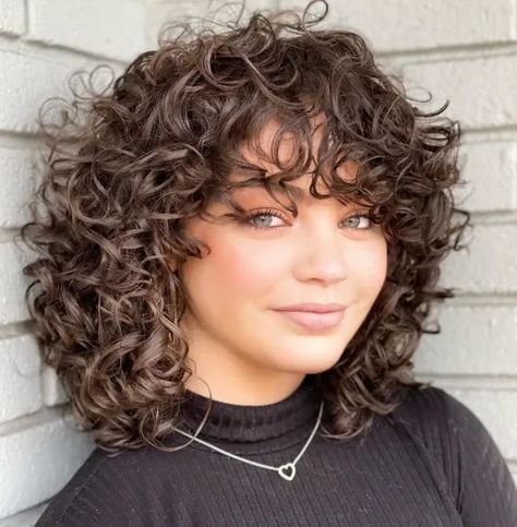 15 Cute Styles Featuring Curly Hair with Bangs - Fimaan Curly Haircuts Medium With Bangs, Haircuts For Wavy Curly Hair Long Layered Bangs, Mid Length Curly Hair With Bangs, Bangs With Curly Hair Natural Curls, Layered Curly Haircuts With Bangs, Natural Curly Hair With Bangs, Natural Wavy Hair Bangs, Curly Cut With Bangs, Curly Bangstyle Hair