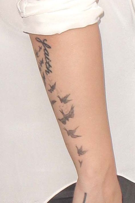 Demi Lovato Flock of Birds Forearm Tattoo | Steal Her Style Birds Forearm Tattoo, Flock Of Birds Tattoo, Demi Lovato Tattoos, Tattoos On Wrist, Bird Flock, Bird Tattoos Arm, Bird Tattoo Wrist, G Tattoo, Bird Tattoos