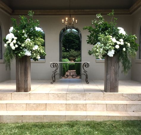 Ceremony Arrangements by Emma Blake Floral at Hopewood House, Bowral Altar Flowers Floor, Ceremony Urn Arrangements, Beam Floral Installation, Pedestal Flowers Church, Church Flowers Floor, Arch Ways, Ceremony Arrangements, Ceremony Arrangement, Romantic Wedding Flowers