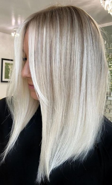 Transport yourself to a tropical paradise with vanilla coconut blonde hair, a soft and creamy shade that evokes images of sun-drenched beaches and swaying palm trees. This subtle yet stunning hue adds warmth and brightness to your locks, creating a dreamy and ethereal look that’s perfect for the summer months. Beige Lowlights, Lowlights For Blonde Hair, Lowlights For Blonde, Blonde Highlights And Lowlights, Icy Blonde Highlights, Icy Blonde Hair, Blonde Hairstyles, Highlights And Lowlights, Icy Blonde