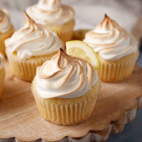 Sweet and Tangy Lemon Meringue Cupcakes Lemon Meringue Cupcakes, Meringue Cupcakes, Lemon Blueberry Bundt Cake, Homemade Banana Pudding Recipe, Homemade Banana Pudding, Sugar Frosting, Southern Desserts, Carrot Cake Cupcakes, Sweet Butter