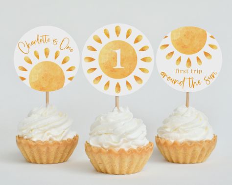 "MATCHING BUNDLE - https://etsy.me/3PrnBag MATCHING ITEMS - https://etsy.me/3zWYJ3V * * * FIRST TRIP AROUND THE SUN CUPCAKE TOPPERS TEMPLATE * * * Customize this template yourself to suit what you need! All of the editing is done through the Templett website so you won't need any special software, but a laptop or computer is a must (phone and tablets not supported). Edit, download and print yourself or share electronically to your guests. All text is editable so you can change it up to cater to Decor Anniversaire, Sunshine Cupcakes, Sun Cake, 1st Birthday Cupcakes, Sunshine First Birthday, Cupcake Toppers Template, Sunshine Birthday Parties, Cupcake Decor, First Trip Around The Sun