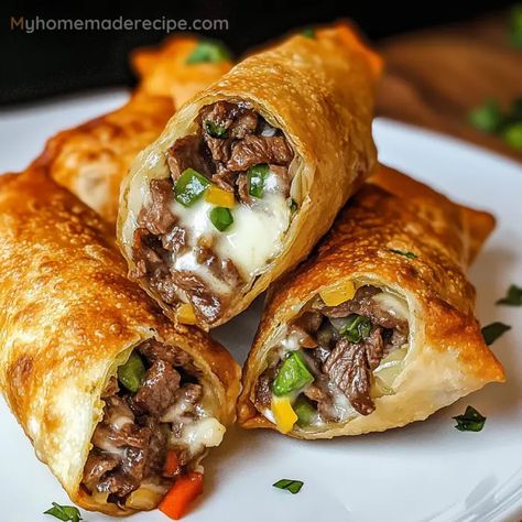 Crispy Philly Cheesesteak Egg Rolls Recipe - My Home Made Recipe Philly Steak And Cheese Egg Rolls, Philly Cheese Steak Egg Roll Recipes, Philly Cheese Steak Rolls Recipe, Philly Cheesesteak Roll Ups, Philly Cheese Steak Egg Rolls Ground Beef, Philly Cheesesteak Burrito, Steak Cheese Egg Rolls, Cheesesteak Egg Rolls Recipe, Air Fryer Philly Cheesesteak Egg Rolls