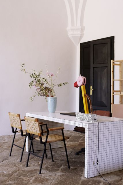 Villa Lena Reception Quaderna table by Superstudio for Zanotta. Tahiti lamp by Ettore Sottsass. Photo © Coke Bartrina Memphis Milano Design, Villa Lena, Tile Furniture, Italian Furniture Design, Tile Table, Italian Interior Design, Italian Interior, Memphis Design, Modern Restaurant