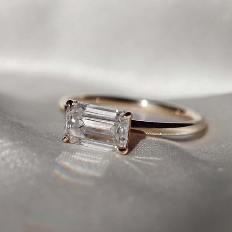 East To West Engagement Ring Emerald Cut, Solitaire Emerald Cut Engagement Ring, Emerald Cut Wedding Ring, Emerald Cut Moissanite Ring, Yellow Gold Anniversary Rings, Wedding Rings Emerald Cut, Top Engagement Rings, Emerald Cut Ring, Diamond Rings With Price