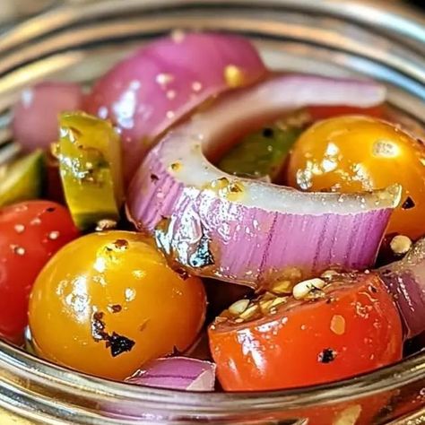 Chef zouheir on Instagram: "Pickled Cherry Tomatoes, Red Onions, and Cucumbers

Ingredients:

- 1 pint cherry tomatoes
- 1/2 red onion, thinly sliced
- 1/2 cucumber, thinly sliced
- 1 cup white vinegar
- 1/2 cup water
- 1/4 cup sugar
- 1 teaspoon salt
- 1/2 teaspoon dried oregano
- 1/4 teaspoon red pepper flakes
- 1/4 cup fresh dill, chopped

Instructions:

1. Prepare the vegetables: Wash and dry the cherry tomatoes, red onion, and cucumber. Thinly slice the red onion and cucumber.
2. Make the pickling liquid: In a small saucepan, combine the white vinegar, water, sugar, salt, oregano, and red pepper flakes. Bring to a boil over medium heat, stirring until the sugar and salt dissolve.
3. Pour the pickling liquid over the vegetables: Place the cherry tomatoes, red onion, and cucumber in a j Pickling Veggies, Pickled Cherry Tomatoes, Apple Cinnamon Recipes, Pickled Tomatoes, Pickled Cherries, Keto Salads, Cinnamon Recipes, Pickled Veggies, Pickled Vegetables