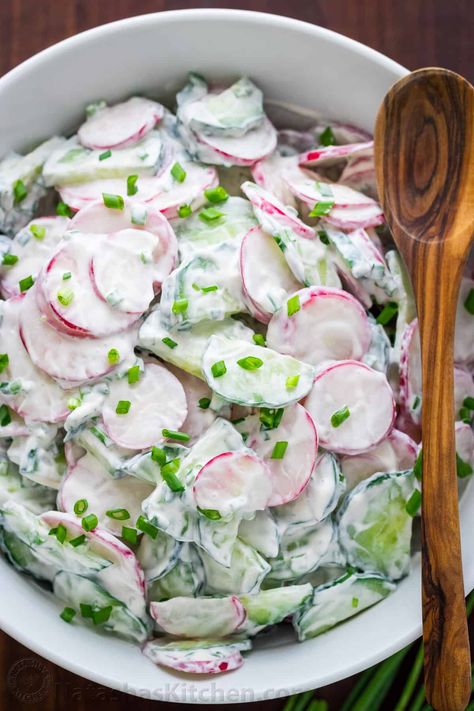 CLASSIC! Cucumber Radish Salad with a simple sour cream dressing. Did you know radishes are a superfood? One of our all-time favorite radish recipes. | natashaskitchen.com Cucumber And Radish Salad Simple, Things To Do With Radishes, Radish Cucumber Salad, Cooked Radishes, Cucumber And Radish Salad, Radish Salad Recipe, Radish Slaw, Cucumber Radish Salad, Outdoor Easter Decor