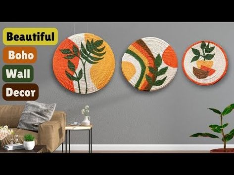 (5226) DIY Boho basket Wall decor I Rope craft ideas 💡 I Cardboard crafts I Wall hanging for home decor - YouTube Jute Rope Canvas Art, Diy Boho Basket, Jute Thread Wall Decor, Jute Wall Art, Wicker Circle Wall Decor, Rattan Circle Wall Decor, Boho Basket Wall Art Different Shapes, Rope Craft Ideas, Boho Basket