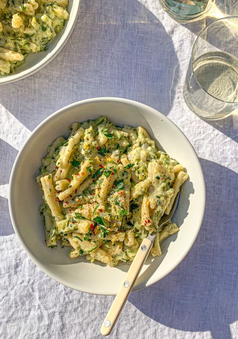 Grated zucchini cooks down with aromatic leeks and garlic until soft, and turns into a sauce with starchy pasta water, lemon, and goat cheese. It's the most luscious, delicious pasta sauce, and the perfect way to use up seasonal zucchini or squash. Lemon Goat Cheese Pasta, Zucchini And Leek Recipes, Zucchini Leek Recipe, Leeks And Zucchini, Leek Pasta Sauce, Leek And Zucchini Recipe, Leek Pasta Recipes, Lemon Zucchini Pasta, Pasta With Leeks